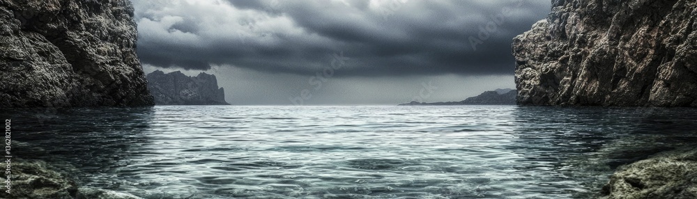 Fototapeta premium A serene seascape with dramatic clouds looming over a rocky cove