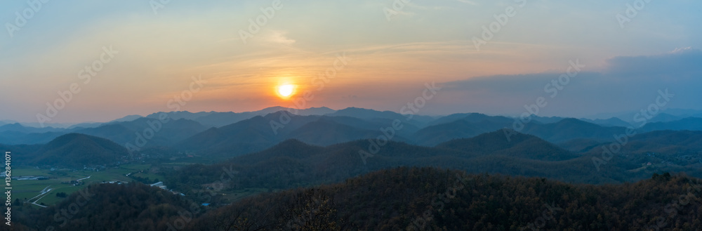 Sunset over rolling mountain ranges in Mae Hong Son, Thailand Sunset over rolling mountain ranges in Mae Hong Son, Thailand