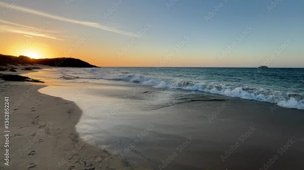 A breathtaking sunset on Margarita Island, Venezuela, with golden sand, ocean waves, and a glowing horizon. A peaceful tropical paradise perfect for relaxation and nature lovers. 4K A breathtaking sunset on Margarita Island, Venezuela, with golden sand, ocean waves, and a glowing horizon. A peaceful tropical paradise perfect for relaxation and nature lovers. 4K