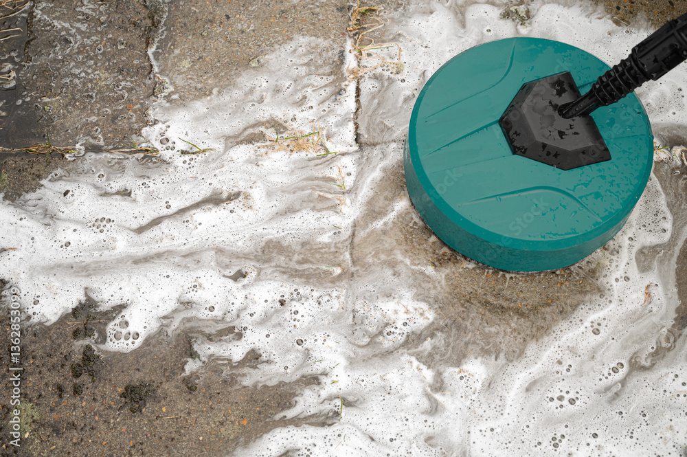 washing cement tiles with a high-pressure cleaner and foam