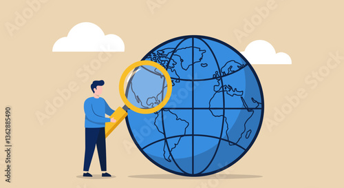 Young man exploring the world with a magnifying glass.