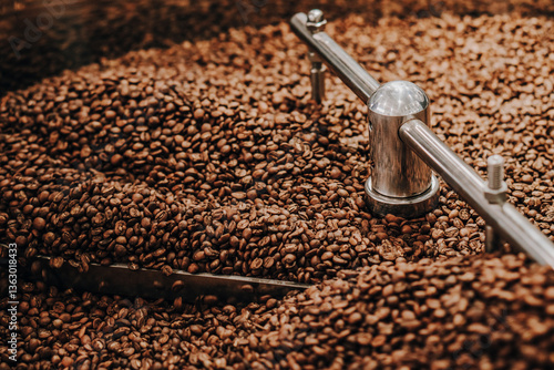 Fotografie Roasted Coffee Beans Inside a Probat Coffee Roaster with Dramatic Lighting