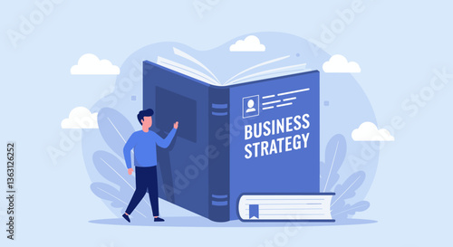 Young man explores a large business strategy book.