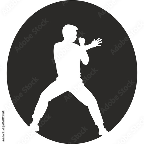 Silhouette of man striking pose in front of  circle background

