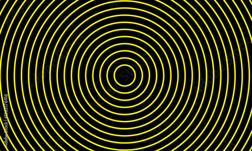Yellow concentric circle illusion on black background