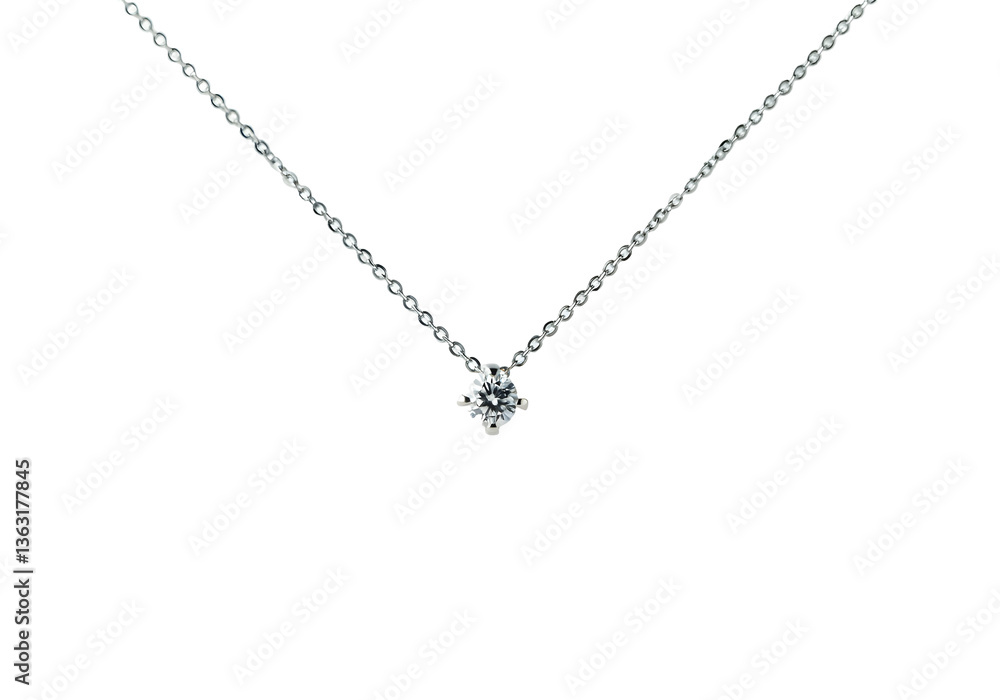 A floating silver necklace with a small diamond pendant, isolated on a solid white background. A floating silver necklace with a small diamond pendant, isolated on a solid white background.