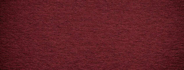 Texture vintage dark red paper gradient background with vignette. Structure craft wine cardboard with frame.