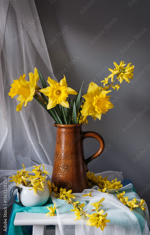 A stunning display of vibrant yellow flowers beautifully arranged in a vintage pitcher