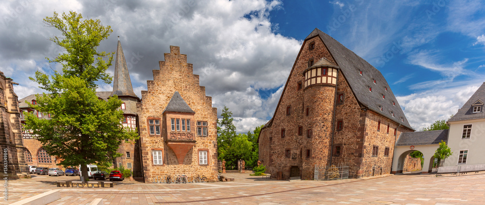 Panoramic view of historic stone and fachwerk buildings in old town of Marburg Germany with square