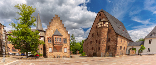 Obraz na płótnie Panoramic view of historic stone and fachwerk buildings in old town of Marburg Germany with square w salonie