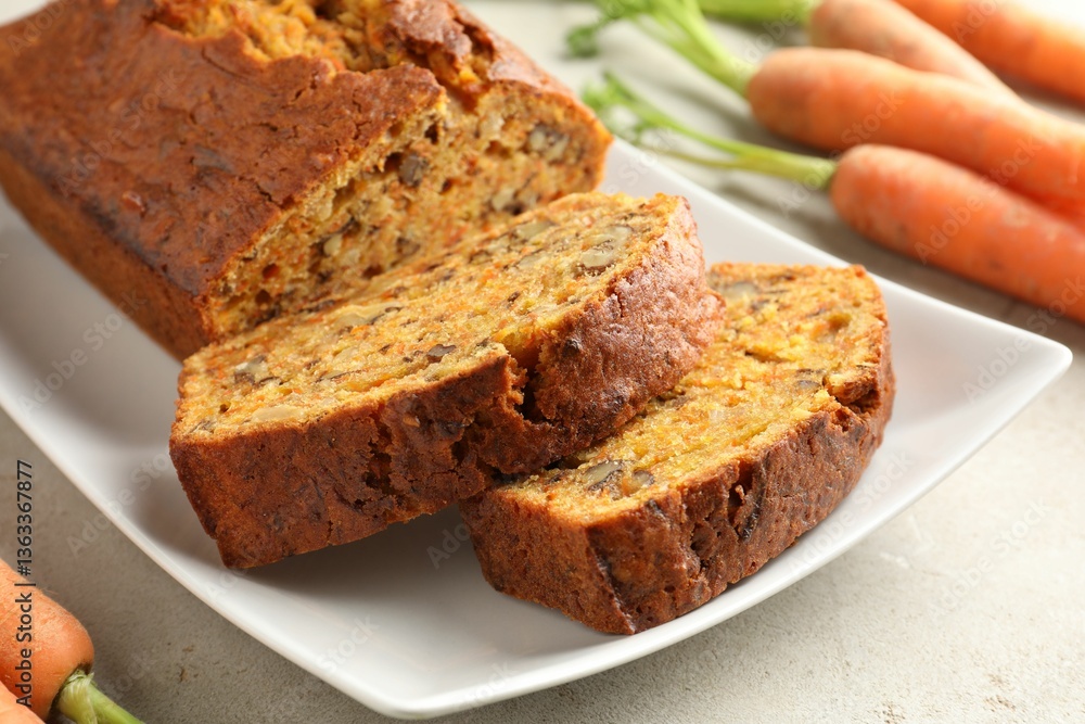 Homemade carrot cake with nuts and vegetables on light grey table, closeup Homemade carrot cake with nuts and vegetables on light grey table, closeup