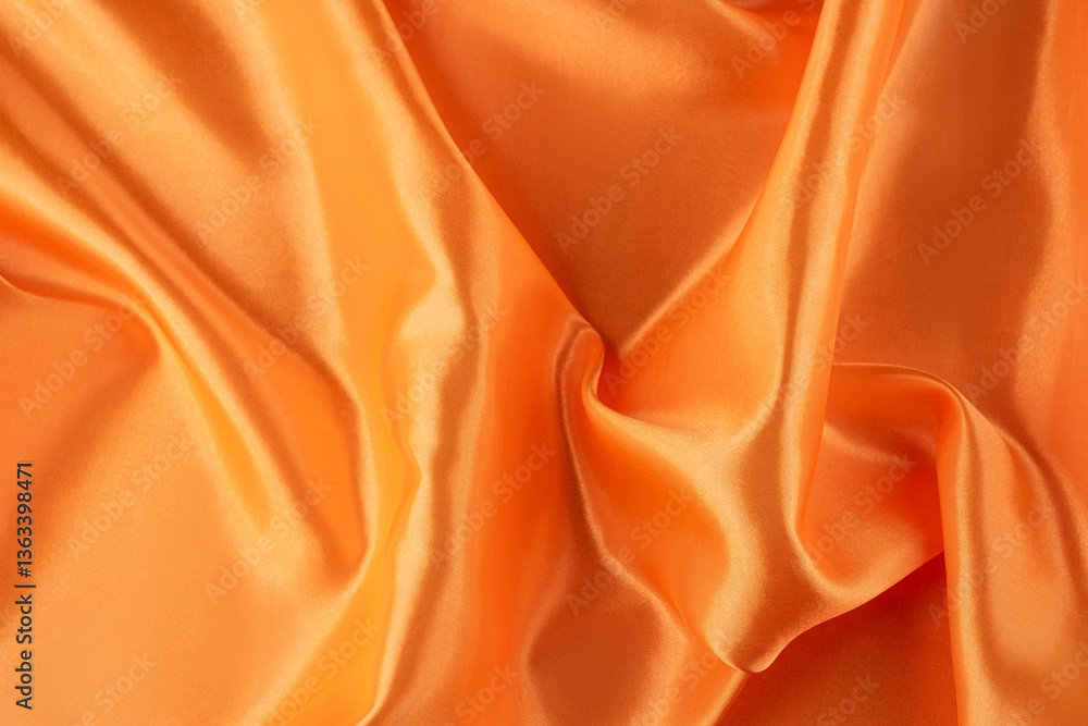 Obraz premium Elegant Golden Satin Fabric with Soft Waves and Reflective Sheen, silk background.
