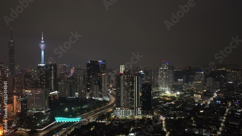 Wallpaper Mural night time illumination kuala lumpur city famous downtown towers traffic road bridge aerial panorama 4k malaysia Torontodigital.ca