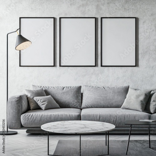 Modern living room with grey sofa, three frames, and marble coffee table.