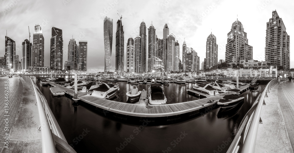 Fototapeta premium Skyscrapers and Urban city skyline over water, black and white style, city background, Dubai Marina bay UAE