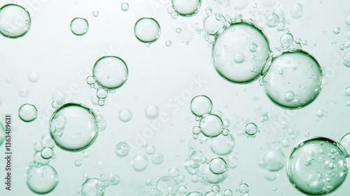 Sparkling green liquid featuring multiple bubbles varying in size, representing freshness, purity, and carbonated beverage aesthetics with dynamic effervescent visual movement