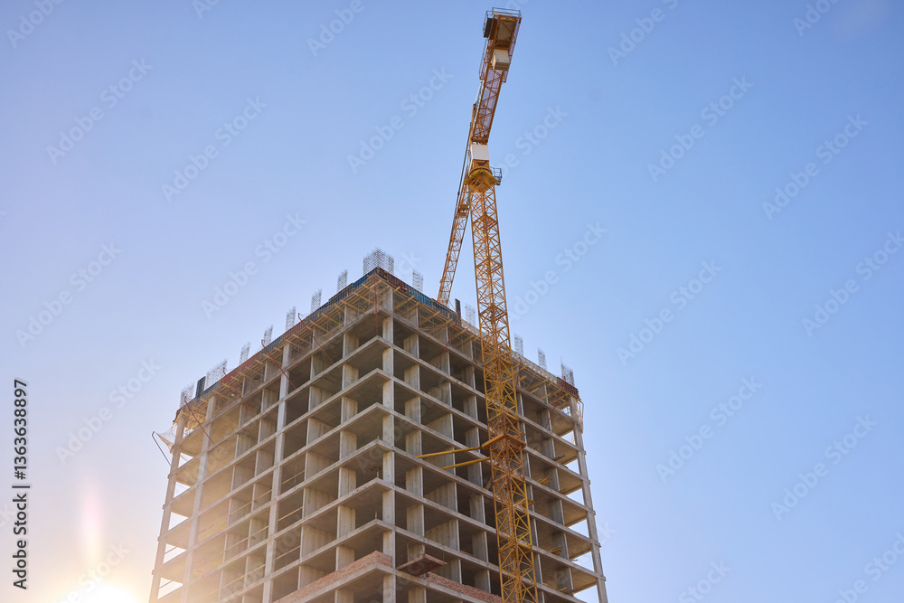 A bustling Construction Site showcasing Cranes, Building Framework, and full activity all around A bustling Construction Site showcasing Cranes, Building Framework, and full activity all around