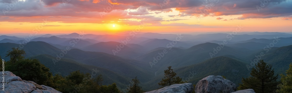 Fototapeta premium Panoramic view of Blue Ridge Mountains at sunset. Colorful sky, silhouettes mountains ranges, green trees, rocks. Golden hour scenery horizon. Perfect outdoor nature travel background.