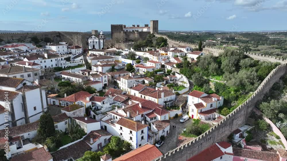 Obidos Skyline At Obidos District Of Leiria Portugal. Medieval Building In A Bustling City Viewed From Above. Business Clouds Sky Downtown Cityscape. Business Backgrounds Panoramic City. Obidos Skyline At Obidos District Of Leiria Portugal. Medieval Building In A Bustling City Viewed From Above. Business Clouds Sky Downtown Cityscape. Business Backgrounds Panoramic City.
