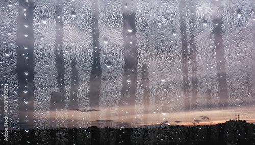 Wallpaper Mural 6月・梅雨　雨の降る暗い曇り空　雲の多い街の風景　雨粒の水滴がついた窓ガラス越しの背景　湿気で曇る表面　季節・湿度・天気 Torontodigital.ca