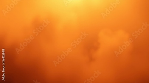 Fiery Sunset: Ethereal Scene of Soft Silhouette Clouds Against a Bright Orange-Red Sky Captured During Golden Hour