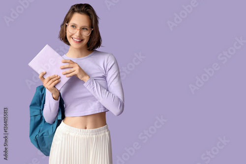 Beautiful female student wi...