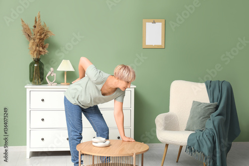 Mature woman suffering from...