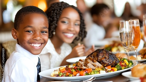 Happy children at a family dinner.
