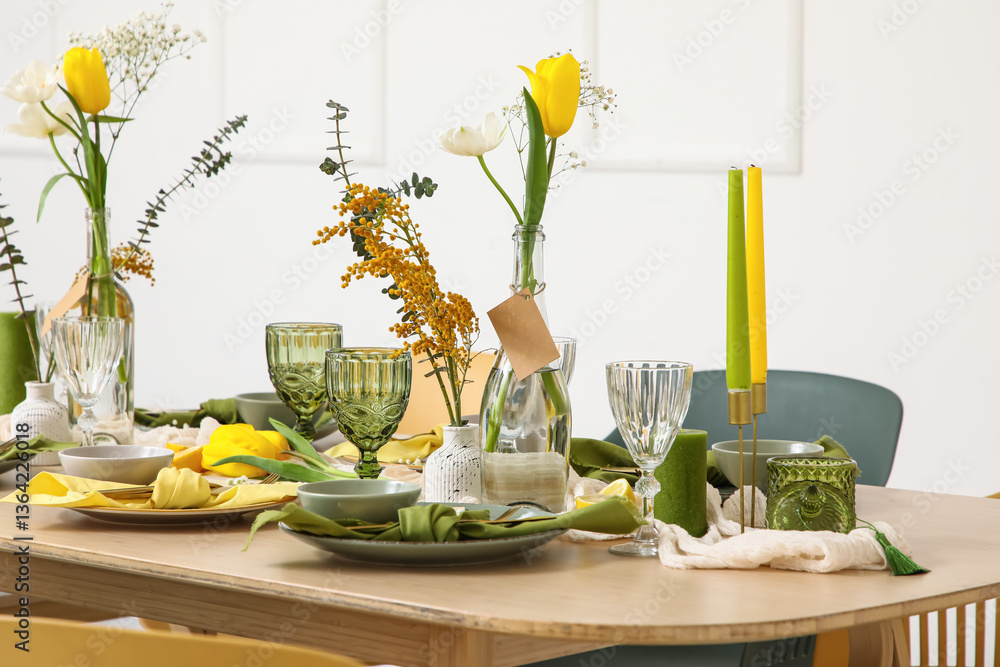 Naklejka premium Table setting with spring flowers in light room