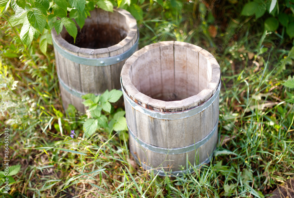 Two wooden planters are sitting in the grass Two wooden planters are sitting in the grass
