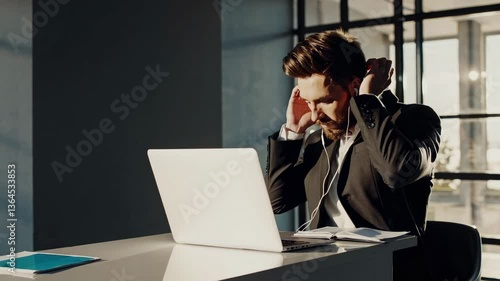 The Businessman with Headphones