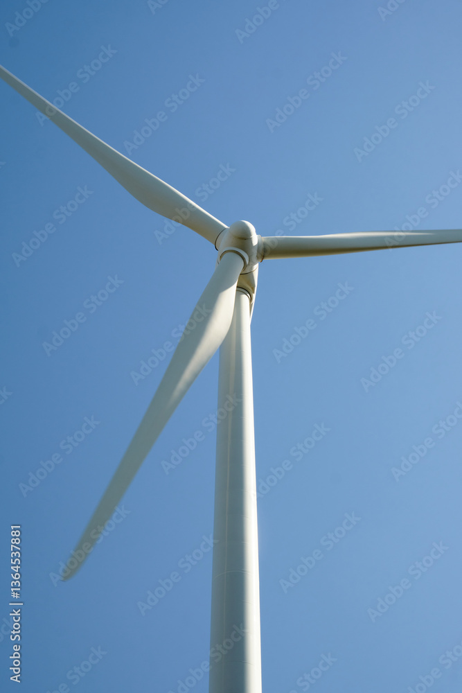 Wind turbine with blue sky at background Wind turbine with blue sky at background
