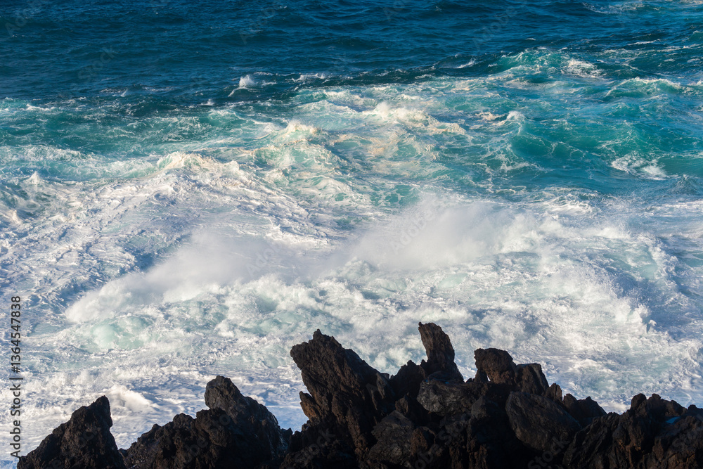 Big powerful storm waves in Porto Moniz, on the Madeira Atlantic coastline