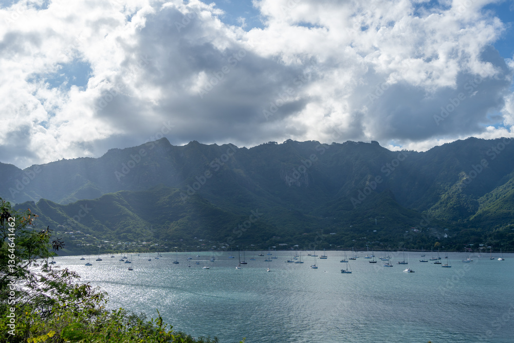 Taiohae Bay and town with anchored sailboats in Nuku Hiva, Marquesas Islands, French Polynesia