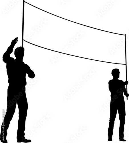 Two protestors or demonstrators at a demonstration march, picket line or strike protest rally in silhouette. Holding up a banner sign.