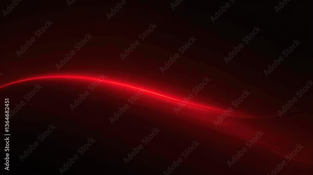 Obraz premium A red line of light streaks across a dark space, symbolizing high-speed motion and digital technology, creating a sense of rapid movement and energy.