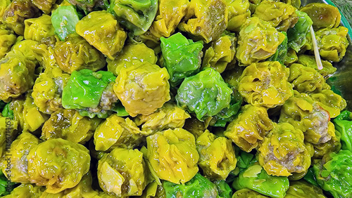 Steamed dumplings in a Thai food market

