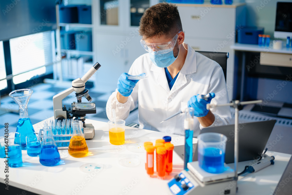 Fototapeta premium male scientist working with micro pipettes analyzing biochemical samples, advanced science chemical laboratory for medicine.