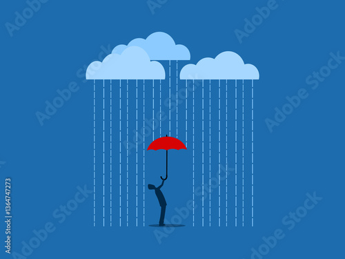 Businessman with red umbrella standing under the falling rain