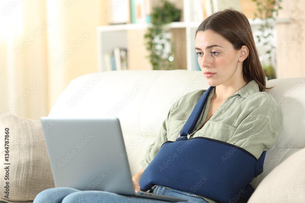 Handycapped woman using laptop at home Handycapped woman using laptop at home