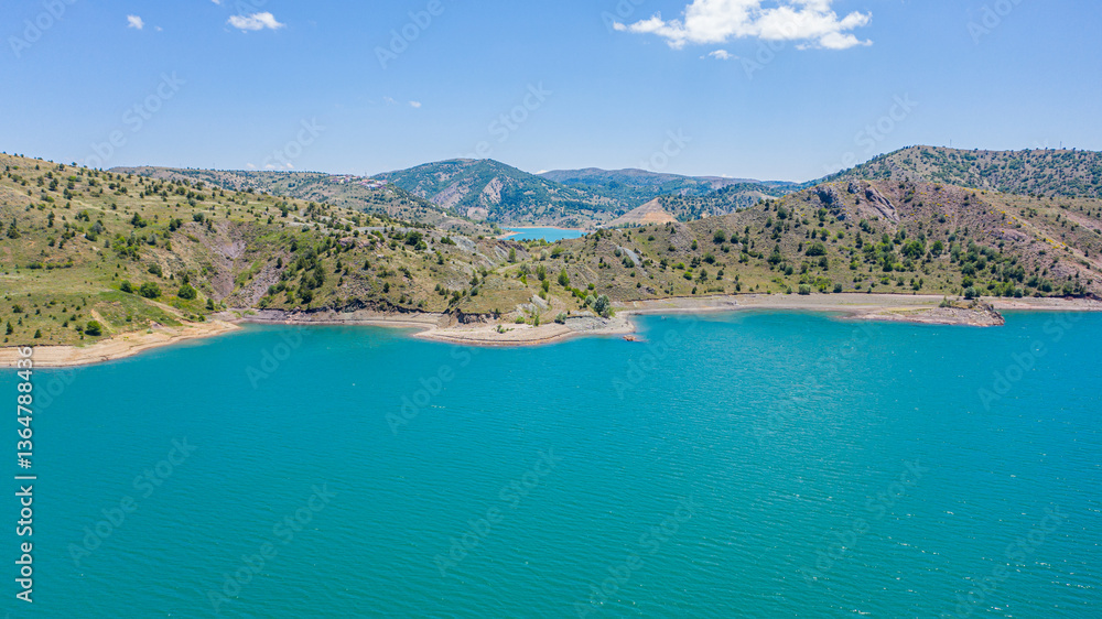 Naklejka premium Aerial view of Pusat Dam lake in green valley Halfeti Sivas Turkey