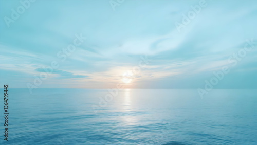 Bright sun creating a dazzling reflection path across calm blue water under a vast pale blue sky with scattered soft white clouds, conveying serenity and midday brightness