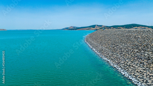 Obraz na plátně Aerial view of Ataturk Dam embankment structure with sign Bozova Sanliurfa Birec