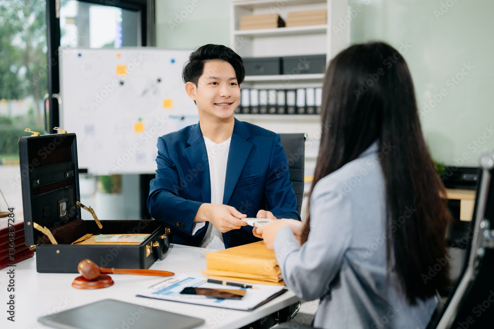 justice and law concept.passing bribe money in the envelop at lawyer office. justice and law concept.passing bribe money in the envelop at lawyer office.