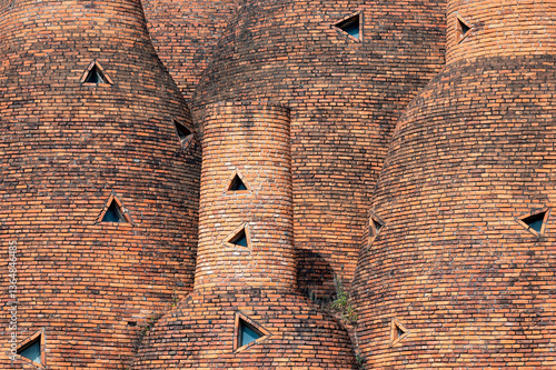 Fotografi Close-up of vintage red brick building characteristic of Yunnan, China