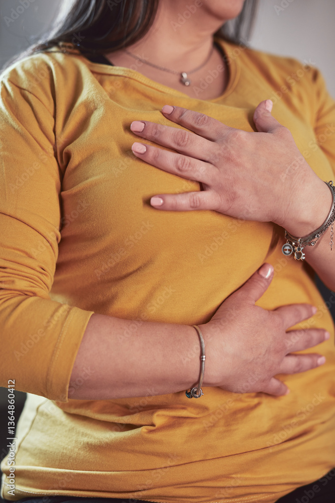 Woman with strong stomach ache, menstrual and digestive issues at home.