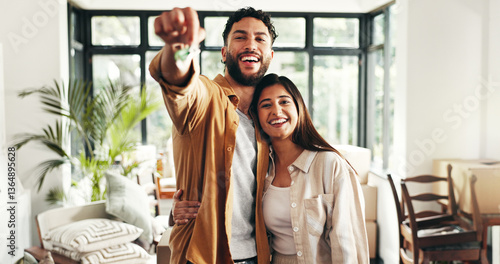 Key, happy and portrait of couple in new home with pride for property investment or real estate. Smile, confident and people from India with ownership for house with goal for buying apartment.