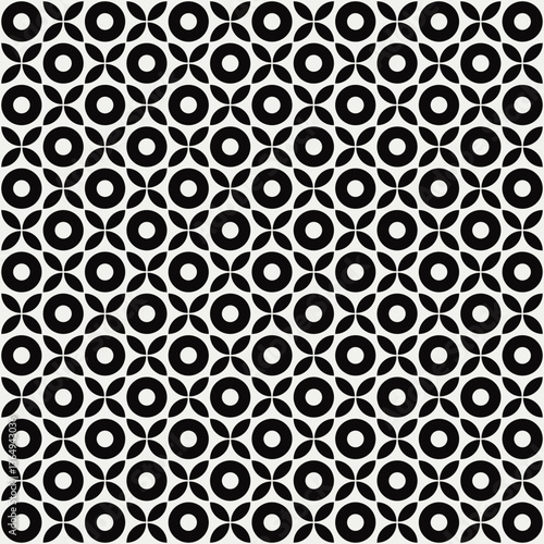 Seamless florals and circles vector pattern in black and white. Graphical illustration for a unique wall decor, textiles and interior design.