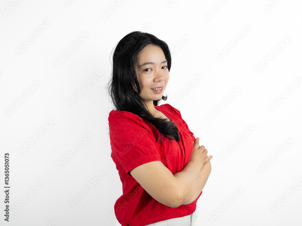 Portrait of happy Asian woman smiling, posing confidently, crossing arms over chest, standing on white background Portrait of happy Asian woman smiling, posing confidently, crossing arms over chest, standing on white background