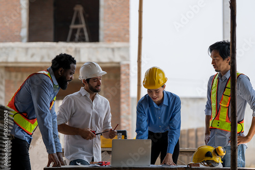 Quadro em tela Construction engineers supervising progress of construction project